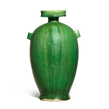 View full screen - View 1 of Lot 719. An ovoid green-glazed pottery vase, Liao dynasty | 遼 綠釉穿帶盤口瓶.