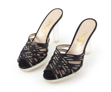 View full screen - View 1 of Lot 27. CHANEL | PAIR OF BLACK FABRIC AND PVC MULES .