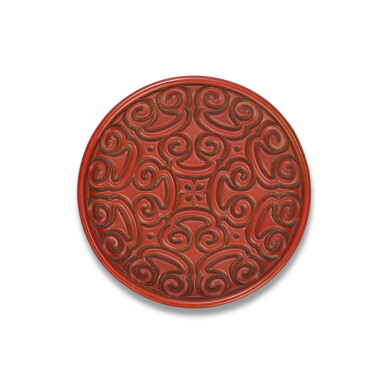 View full screen - View 1 of Lot 62. A cinnabar lacquer guri dish, Ming dynasty, 16th century | 明十六世紀 剔犀圓盤 《安》款.
