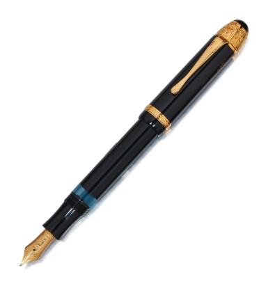 View full screen - View 1 of Lot 34. MONTBLANC | A LIMITED EDITION GOLD PLATED AND BLACK RESIN FOUNTAIN PEN, CIRCA 1995.