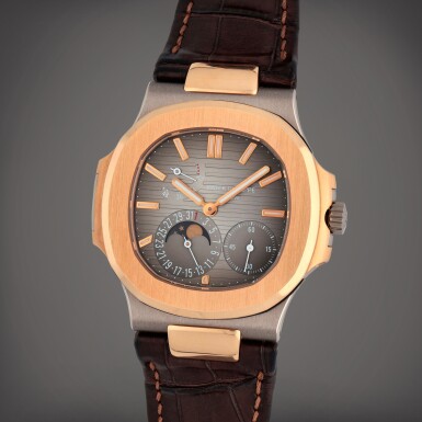 View full screen - View 1 of Lot 32. Nautilus, Reference 5712GR-001 A white and pink gold wristwatch with date, moon phases and power reserve indication Circa 2010.