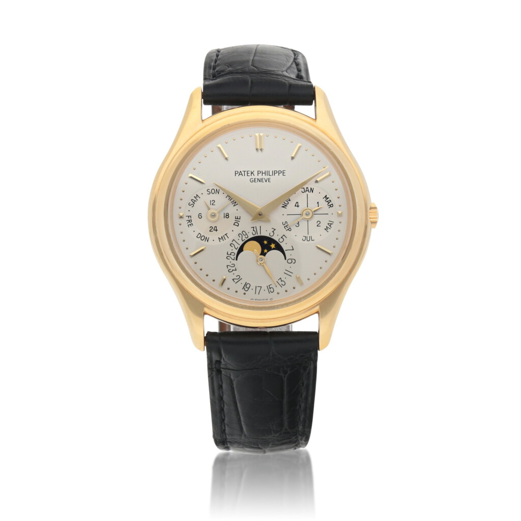 View full screen - View 1 of Lot 57. 'German Calendar', Ref. 3940J, Yellow gold perpetual calendar wristwatch with moon phases, 24-hour and leap-year indication Made in 1991 | 百達翡麗 | 3940J型號「German Calendar」黃金萬年曆腕錶備月相、24小時及閏年顯示,1991年製.