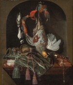 Still life of game with a partridge, falcon hoods, a kingfisher and songbirds, with a horn and a hunting bag on a marble ledge