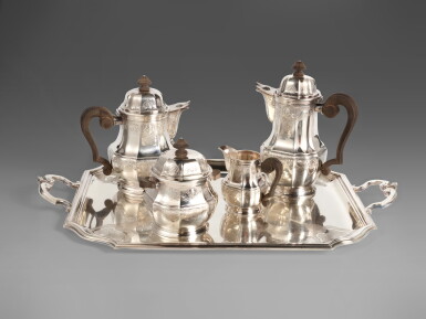 View full screen - View 1 of Lot 765. A French Silver Four-Piece Tea and Coffee Service with Two-Handled Tray, Christofle, Paris, Mid 20th Century.