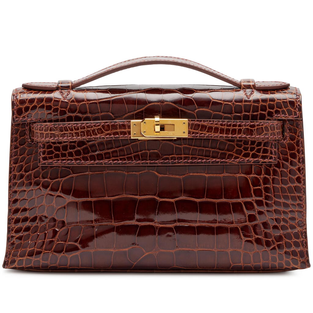 View full screen - View 1 of Lot 47. Miel Shiny Mississippiensis Alligator Kelly Pochette Gold Hardware, 2009.