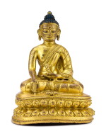 A GILT-BRONZE FIGURE OF AKSHOBHYA BUDDHA, TIBET, 16TH CENTURY | 十六世紀 藏傳鎏金銅阿閦佛坐像