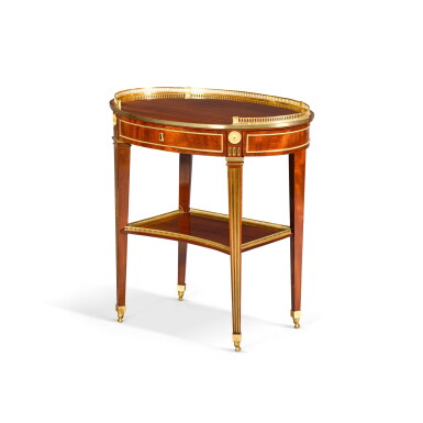 View full screen - View 1 of Lot 13. A German gilt-bronze mounted mahogany oval table, circa 1785-90, attributed to David Roentgen.