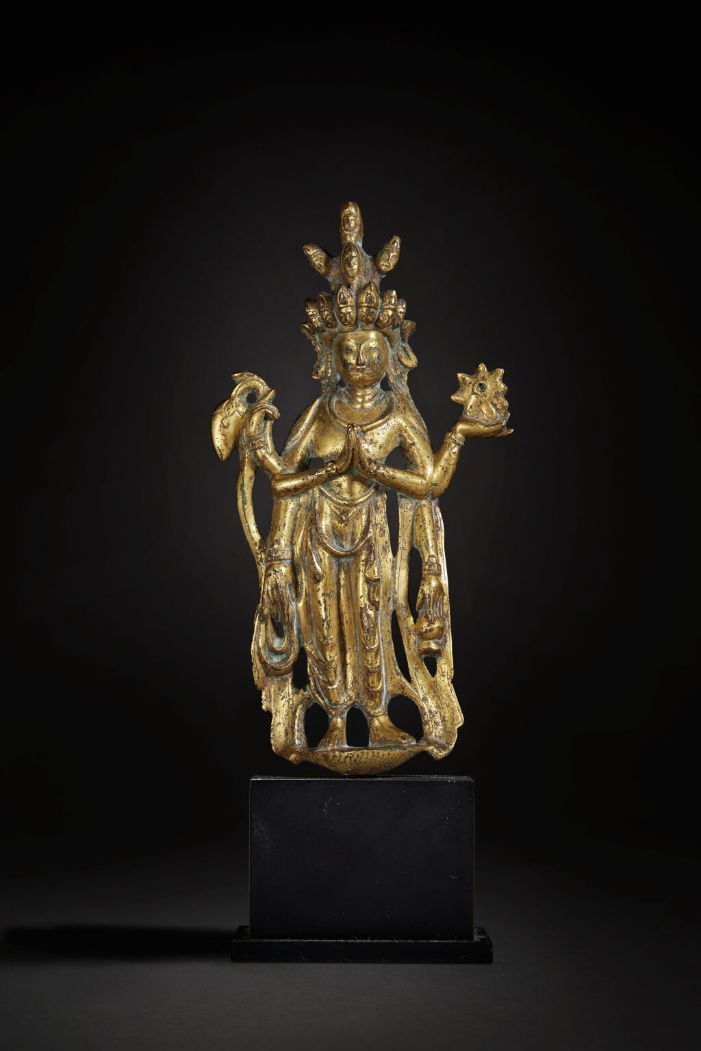View full screen - View 1 of Lot 161. An extremely rare gilt-bronze figure of eleven-headed Avalokiteshvara, Tang dynasty.
