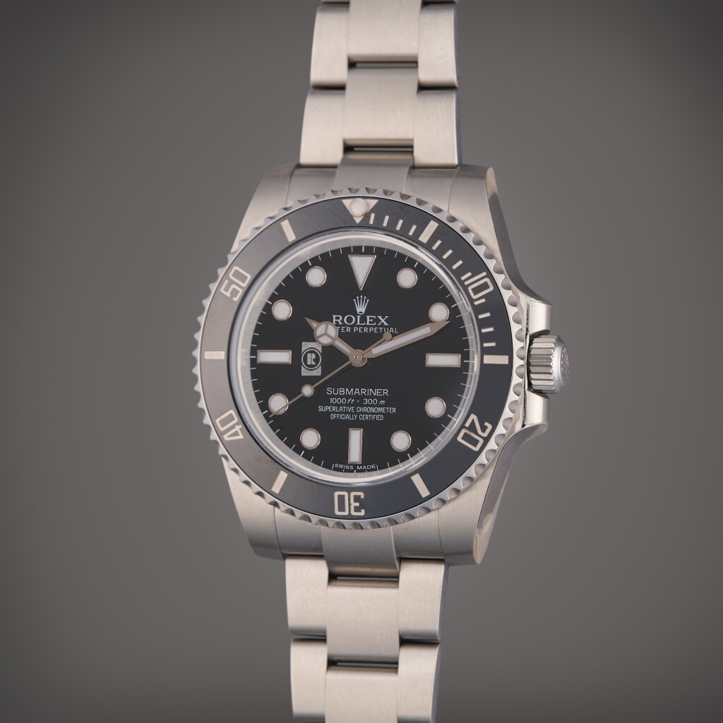View full screen - View 1 of Lot 316. Reference 114060 Submariner 'Romac Industries, Inc' | A stainless steel automatic wristwatch with bracelet, Circa 2016.