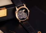 Reference 115.031 Grand Lange 1 | A pink gold wristwatch with digital date display and power reserve indication, Circa 2004