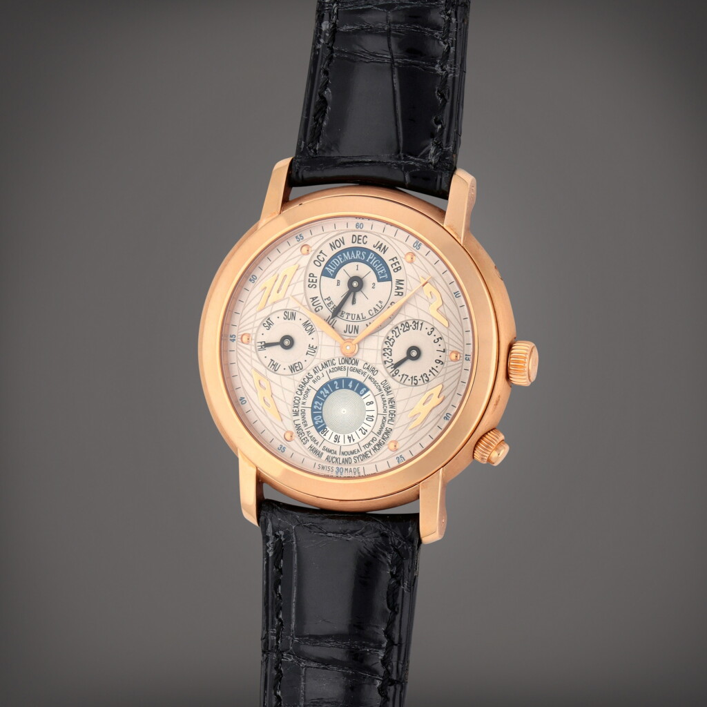View full screen - View 1 of Lot 299. Jules Audemars Quantième Perpétuel Métropolis, Reference 25919OR/O/0002CR/01 | A pink gold world time perpetual calendar wristwatch with leap year indication | Circa 2002.