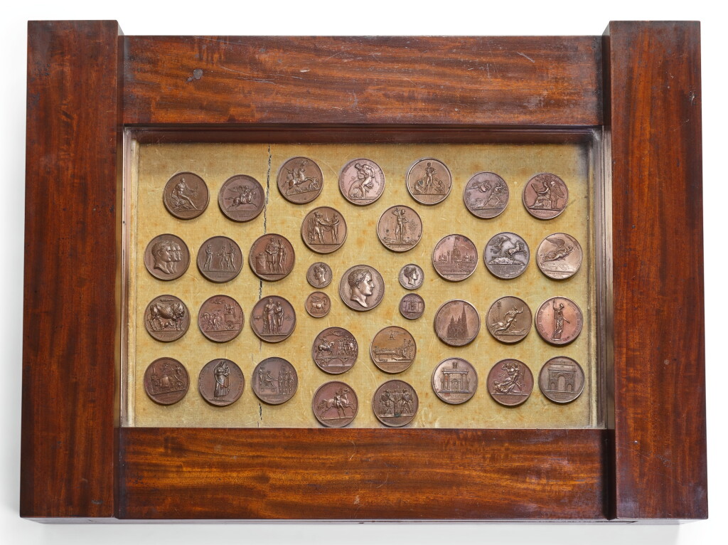 View full screen - View 1 of Lot 214. A WILLIAM IV MAHOGANY TABLE VITRINE CONTAINING A GROUP OF EARLY 19TH CENTURY BRONZE NAPOLEONIC MEDALS, FIRST HALF 19TH CENTURY.