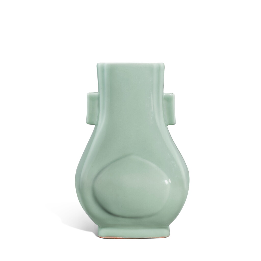 View full screen - View 1 of Lot 3377. A celadon-glazed hu-form vase, Mark and period of Guangxu | 清光緒 豆青釉杏圓貫耳瓶 《大清光緒年製》款.
