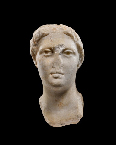 View full screen - View 1 of Lot 235. A Hellenistic Marble Head of a Ptolemaic Queen, 3rd/2nd Century B.C..