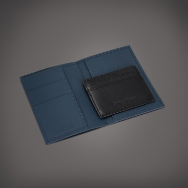 View full screen - View 1 of Lot 454. A blue calfskin passport holder and a black calfskin and fabric card holder | Circa 2022.