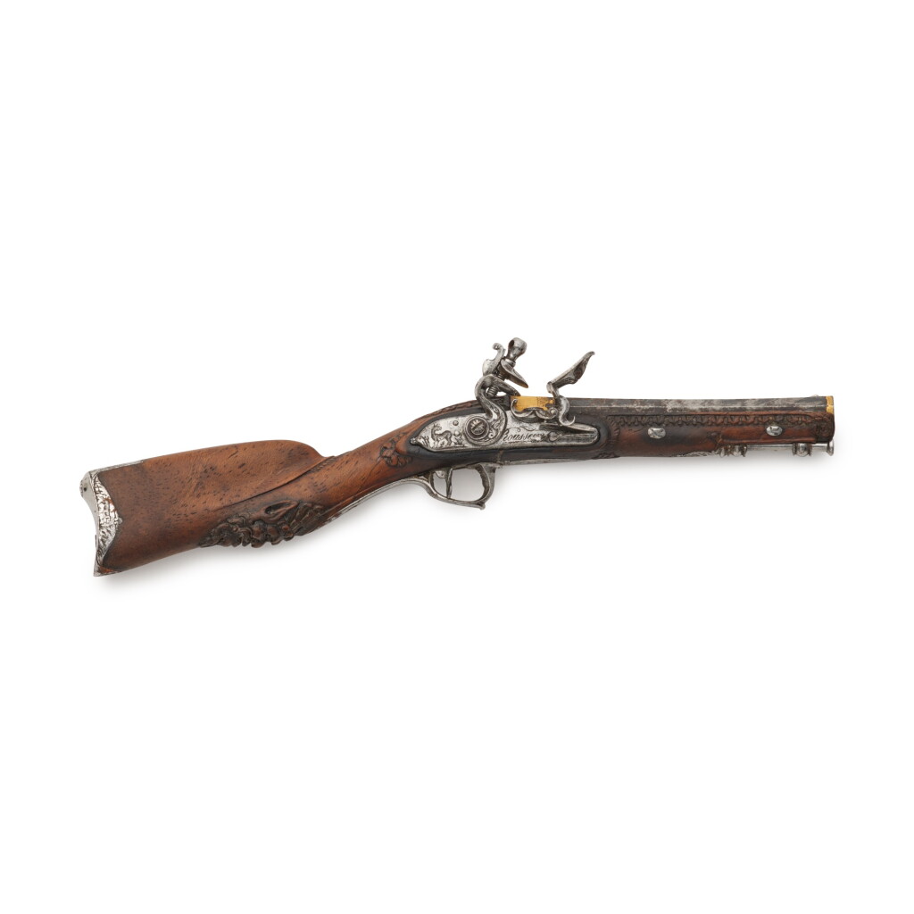 View full screen - View 1 of Lot 117. A probably Netherlandish or French miniature flintlock pistol by Rousseau, 18th century | Miniaturgewehr mit Steinschloss von Rousseau, wohl Niederlande oder Frankreich, 18. Jh..
