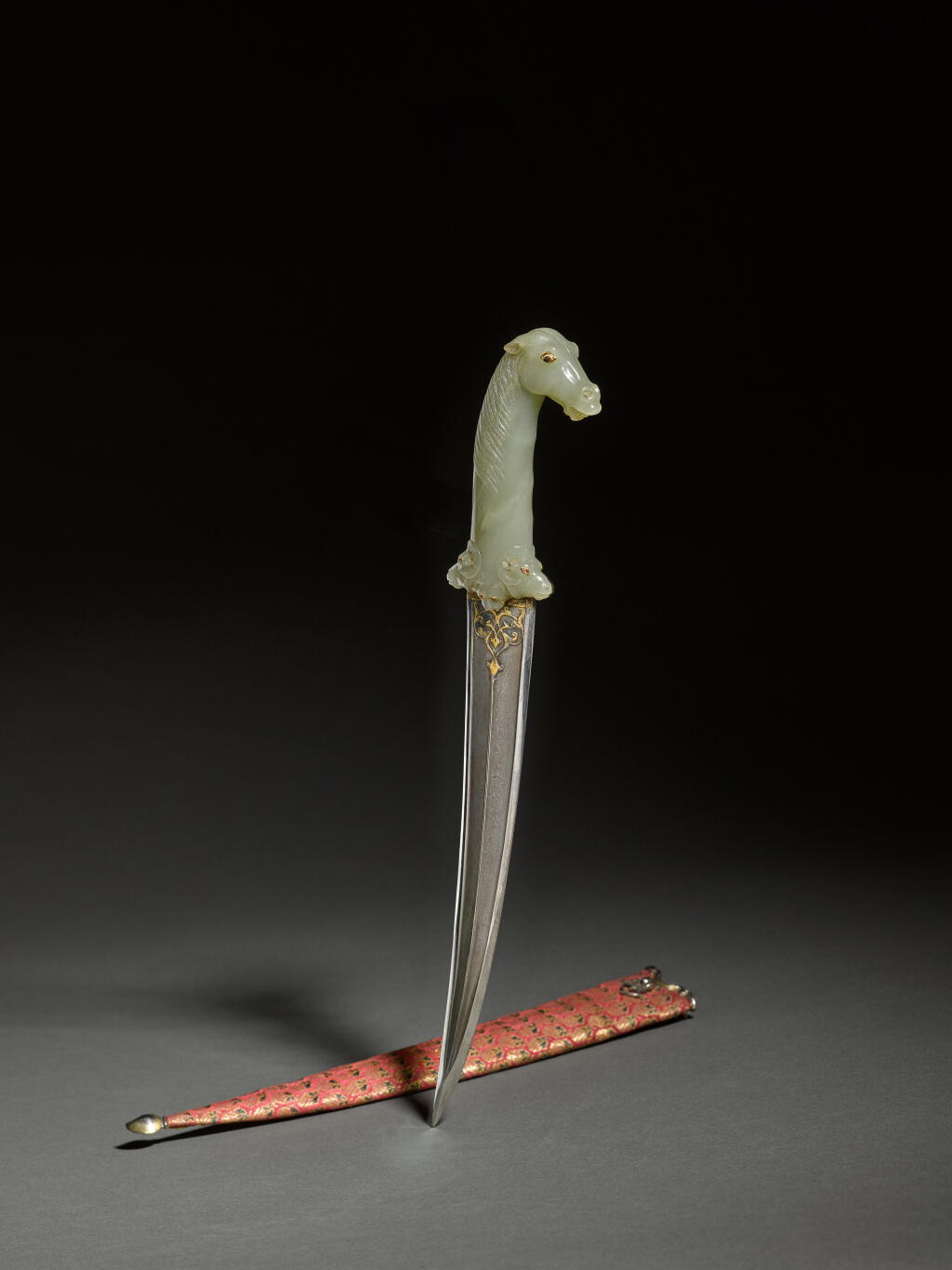 View full screen - View 1 of Lot 41. An Exceptional Mughal Jade-Hilted Dagger in the form of a Horse, India, 17th Century.
