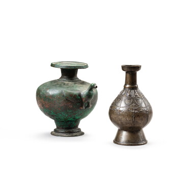 View full screen - View 1 of Lot 84. A bronze Kendi and a bronze bottle vase Tibet and Nepal 19th century | 西藏及尼泊爾 十九世紀 銅軍持及瓶一組兩件.