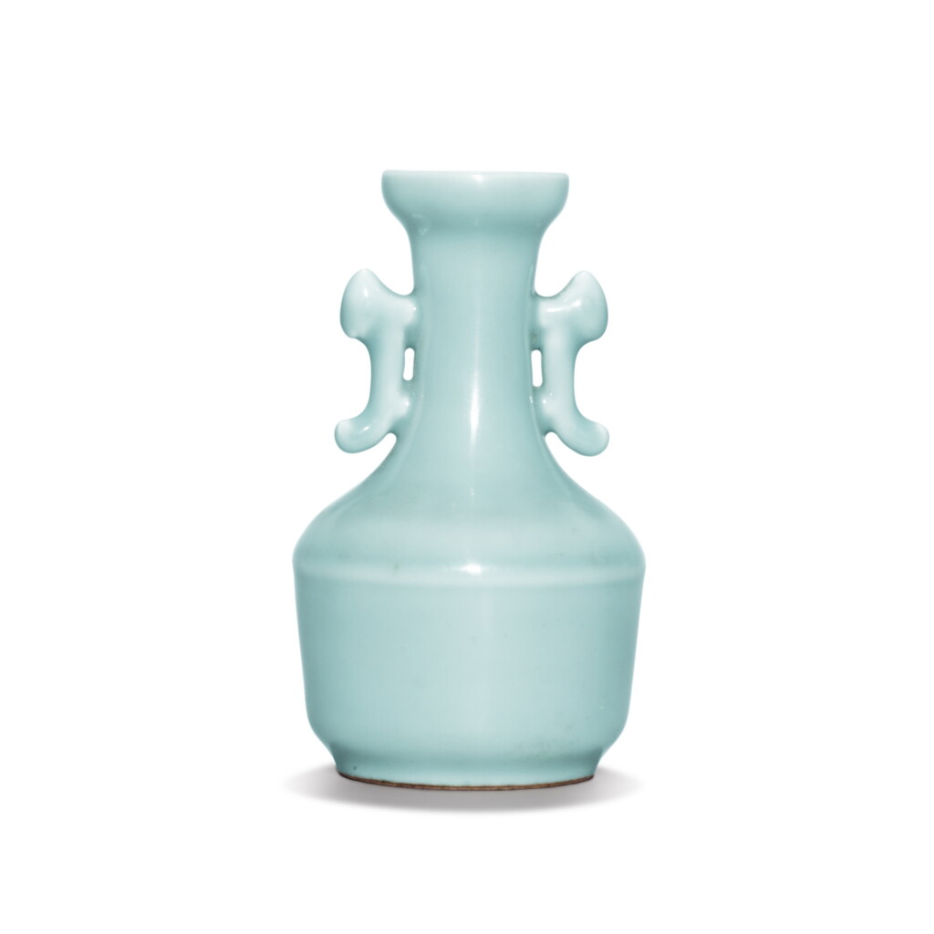 View full screen - View 1 of Lot 168. A small celadon-glazed handled vase, 20th century .