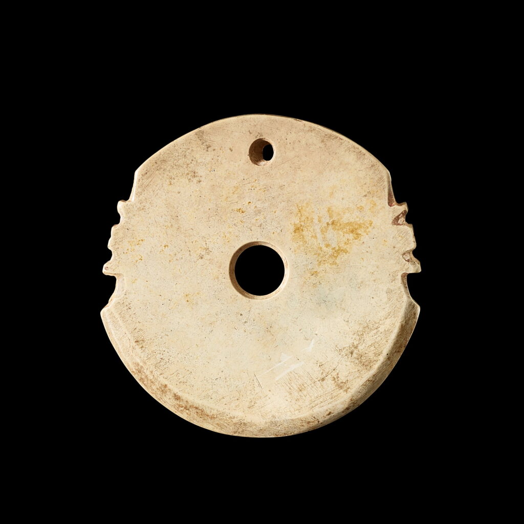View full screen - View 1 of Lot 3606. A small jade axe-shaped pendant, Shang - early Western Zhou dynasty | 商至西周初 戚形小玉飾.