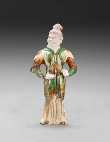 View full screen - View 1 of Lot 18. A large sancai-glazed pottery figure of guardian Tang dynasty | 唐 三彩天王立像.