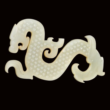 View full screen - View 1 of Lot 13. A SUPERB WHITE JADE S-SHAPED 'DRAGON AND PHOENIX' PENDANT EASTERN ZHOU DYNASTY, WARRING STATES PERIOD | 東周戰國時期 白玉曲體龍鳳珮.