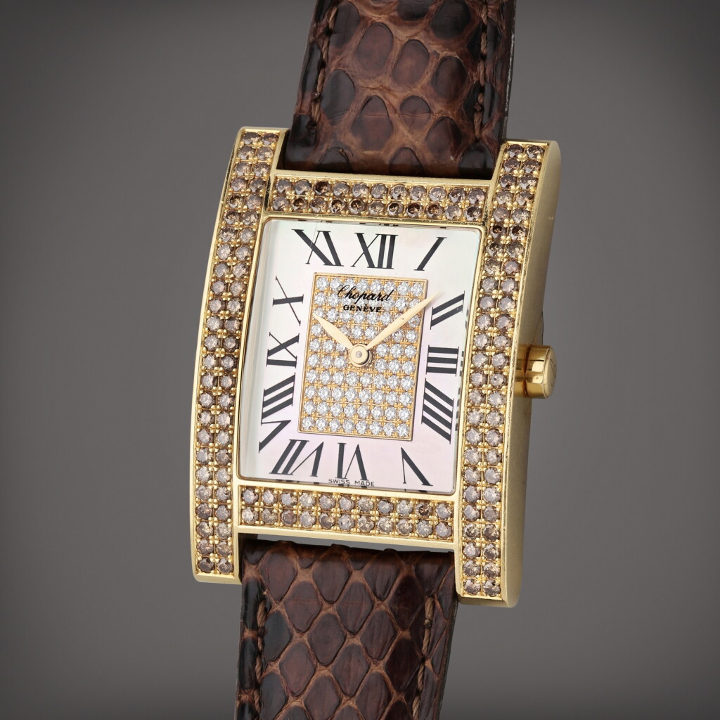 View full screen - View 1 of Lot 89. Reference 17/3451/8-55 H Watch | A yellow gold, colored diamond and diamond-set rectangular wristwatch with mother of pearl dial, Circa 1995.