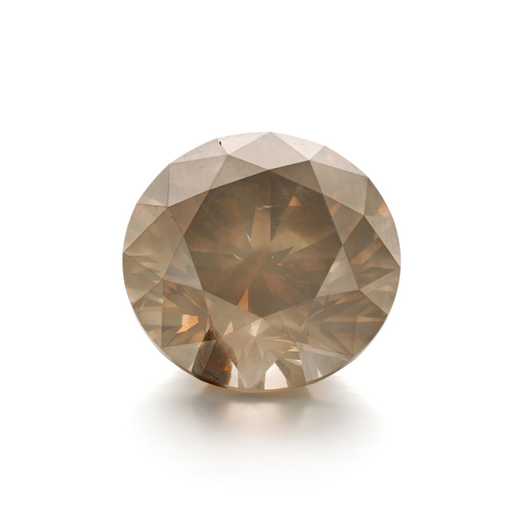 View full screen - View 1 of Lot 893. Unmounted Fancy Grayish Brown Yellow Diamond weighing 6.41 carats.