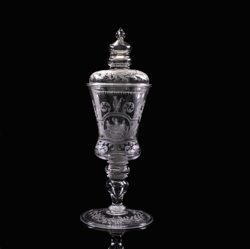 View full screen - View 1 of Lot 88. An `Antimelancholia' engraved glass goblet and cover, Circa 1740, possibly Saxon.