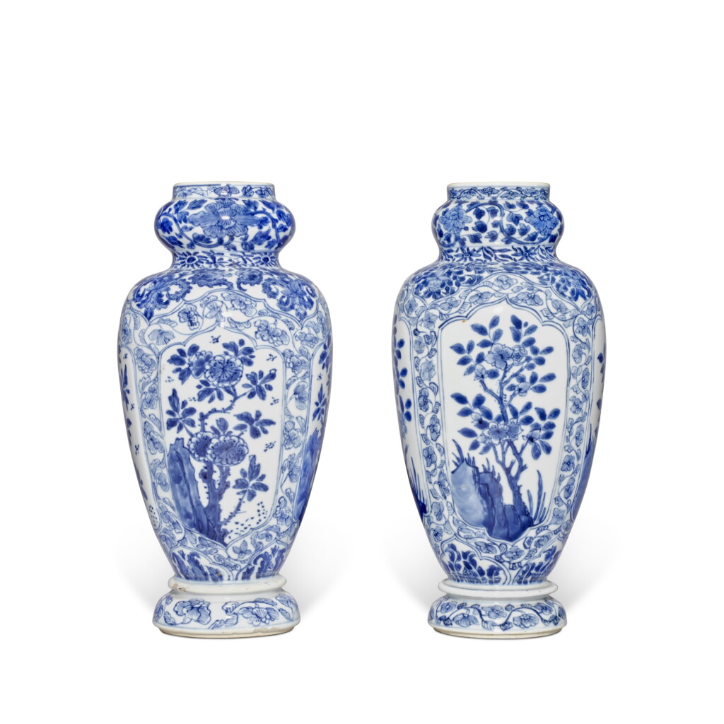 View full screen - View 1 of Lot 920. A pair of blue and white 'floral' vases, Qing dynasty, Kangxi period | 清康熙 青花開光花卉圖瓶一對.