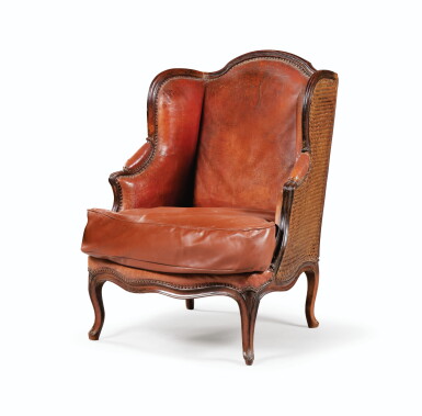 View full screen - View 1 of Lot 58. A LOUIS XV WALNUT BERGÈRE | BERGÈRE À OREILLES EN NOYER MOULURÉ D'ÉPOQUE LOUIS XV.