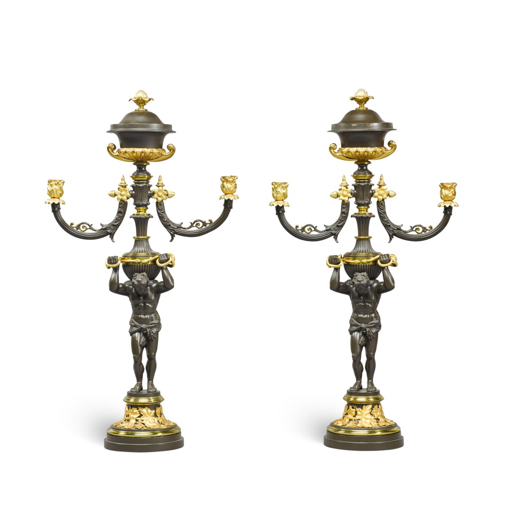 View full screen - View 1 of Lot 296. A pair of English bronze and gilt brass twin-light figural colza lamps, second quarter 19th century.
