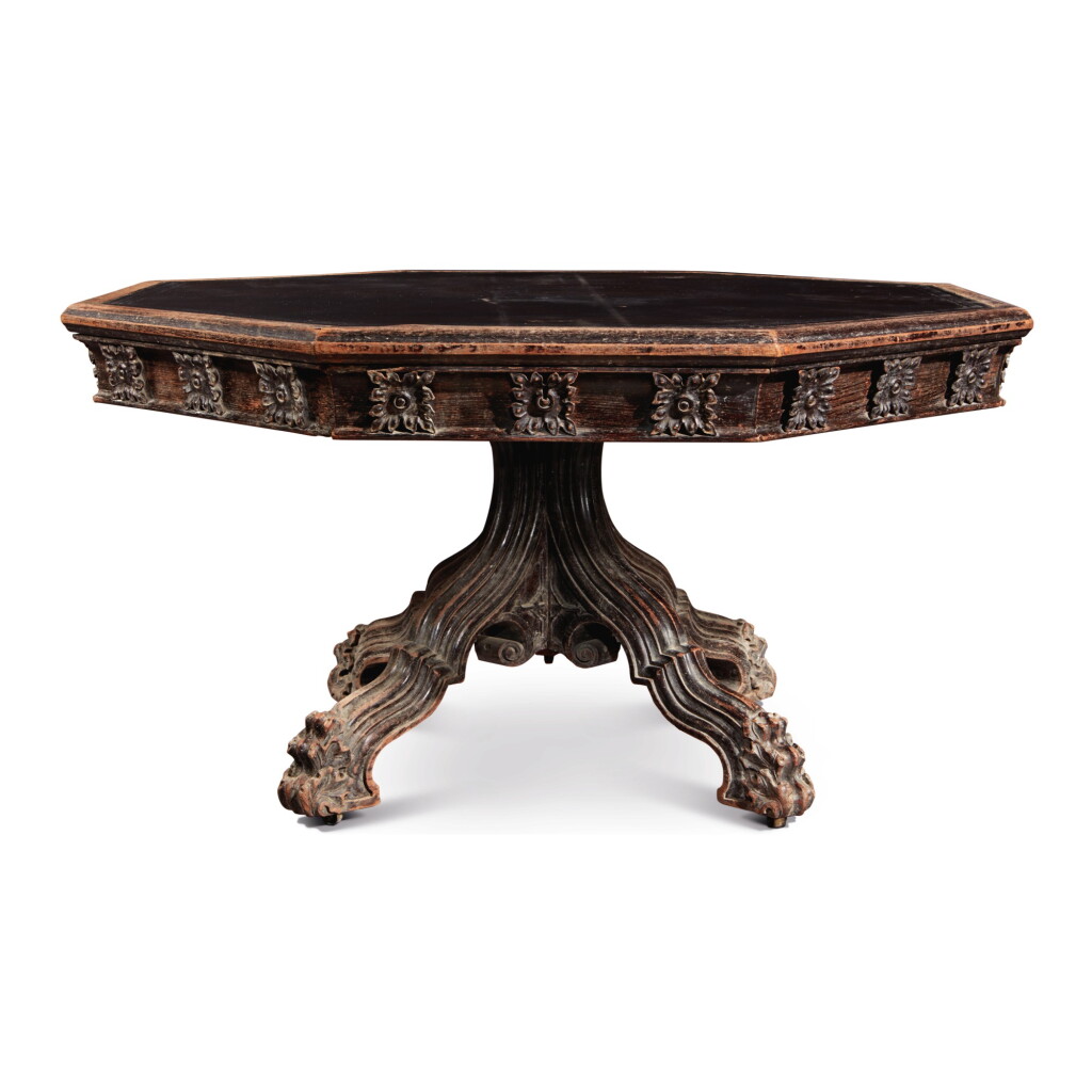 View full screen - View 1 of Lot 748. AN EARLY VICTORIAN NEO-GOTHIC CARVED OAK OCTAGONAL LIBRARY TABLE, MID-19TH CENTURY.