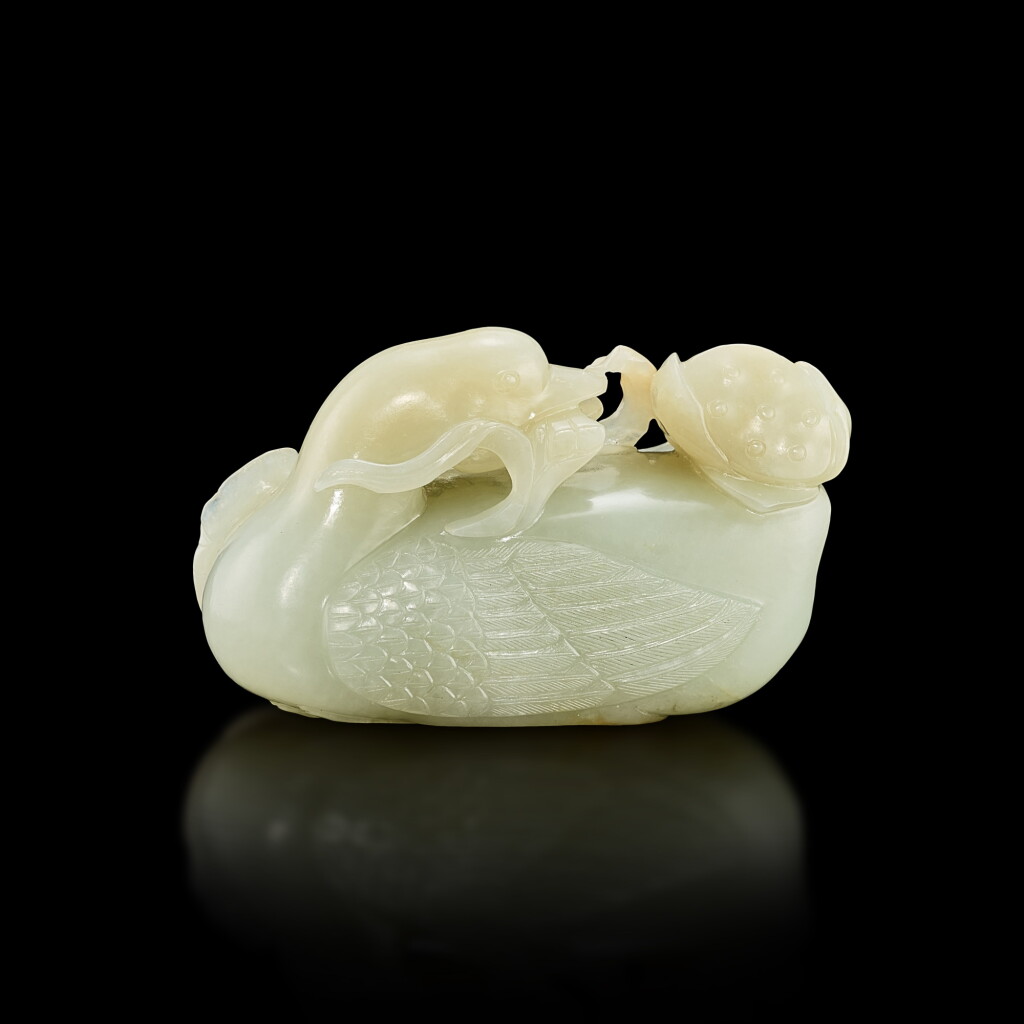View full screen - View 1 of Lot 3010. A celadon jade 'goose and lotus' group, Qing dynasty, 18th century 清十八世紀 青白玉寶鵝銜蓮.