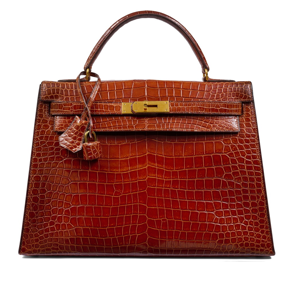 View full screen - View 1 of Lot 56. Vintage Shiny Miel Crocodile Kelly 32 Sellier Gold Hardware, 1981.
