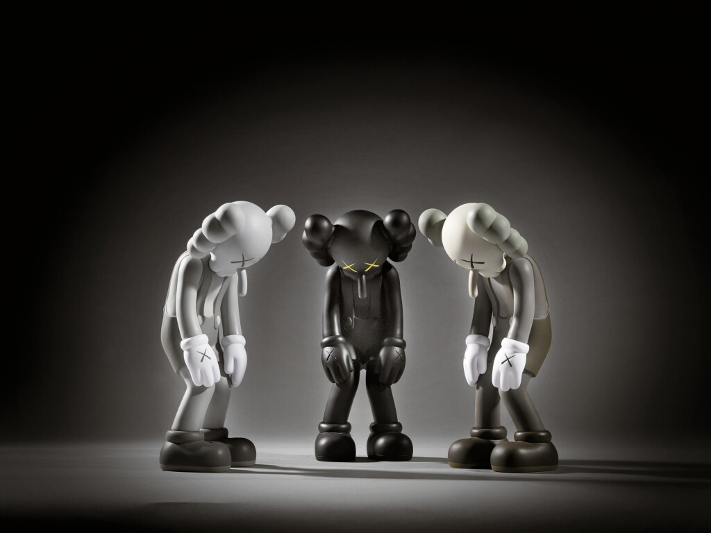 View full screen - View 1 of Lot 24. KAWS | I) SMALL LIE (BROWN) | II) SMALL LIE (BLACK) | III) SMALL LIE (GREY).