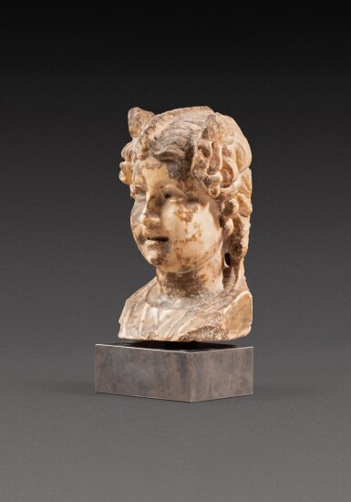 View full screen - View 1 of Lot 177. A Roman Giallo Antico Marble Herm Bust of Eros, circa 1st Century A.D..