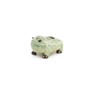 View full screen - View 1 of Lot 50. A small celadon-glazed 'toad' waterpot, Ming dynasty | 明 青釉蛙形水盂.