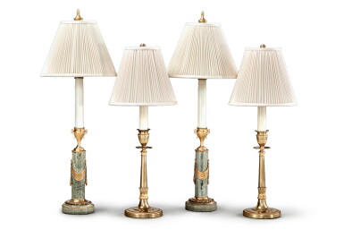 View full screen - View 1 of Lot 215. A Pair of Swedish Neoclassical Gilt Bronze and Grey Porphyry Candlesticks, Late 18th Century, Together with a Pair of Empire Gilt Bronze Candlesticks, 19th Century Now Mounted as Lamps.