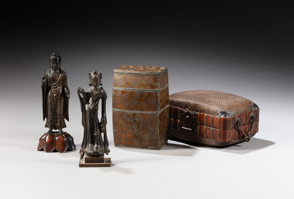 View full screen - View 1 of Lot 75. Two bronze standing figures of Buddha and Avalokiteshvara, Probably Tang dynasty and a bamboo cane box, Japan, probably Edo period, 19th century | 或唐 銅佛及觀音菩薩立像 及 日本 或江戶時代 十九世紀 竹蓋盒 一組三件.