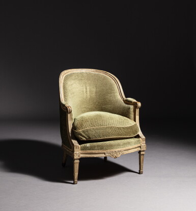 View full screen - View 1 of Lot 439. A Louis XVI white lacquered wood bergere, stamped by Jean-Baptiste Boulard | Bergère en bois laqué d'époque Louis XVI, estampille de Jean-Baptiste Boulard.