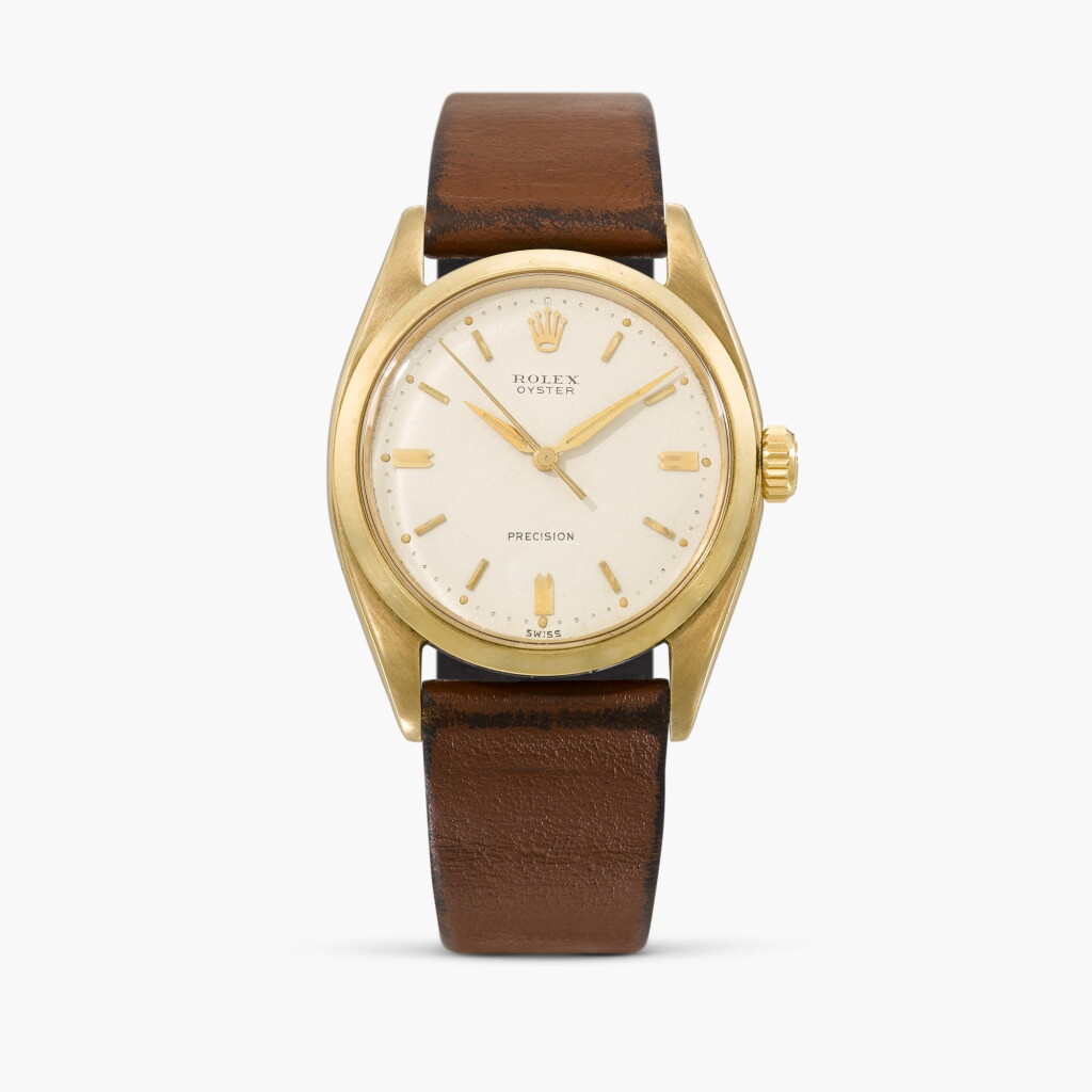 View full screen - View 1 of Lot 38. Oyster Precision, Reference 6427 | A yellow gold wristwatch | Circa 1970.