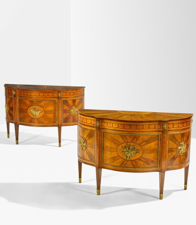 View full screen - View 1 of Lot 16. A pair of George III mahogany, harewood, satinwood and marquetry commodes, circa 1780.