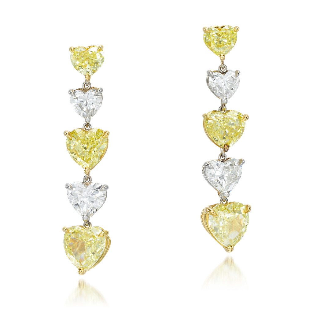 View full screen - View 1 of Lot 112. Pair of Fancy Yellow diamond and diamond earrings.