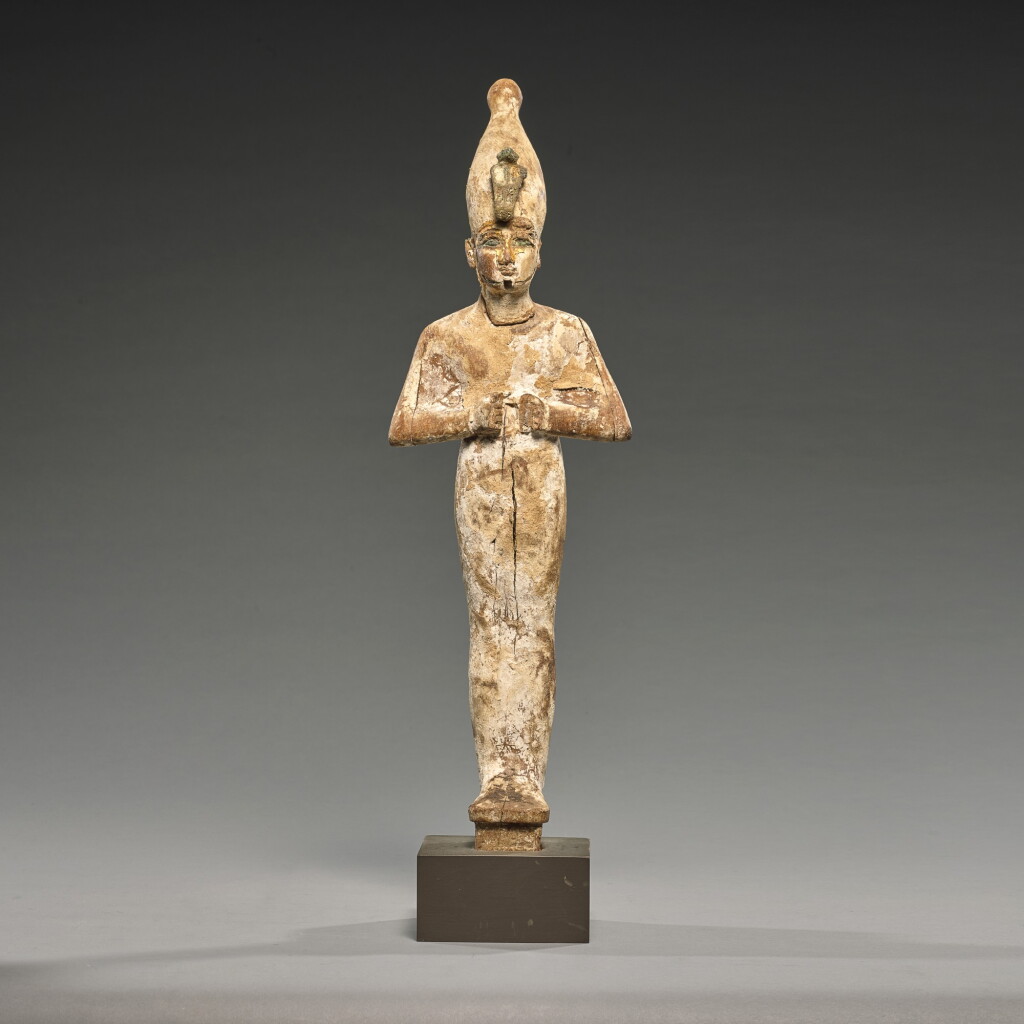View full screen - View 1 of Lot 10. AN EGYPTIAN WOOD FIGURE OF OSIRIS, 3RD INTERMEDIATE PERIOD, 1075-716 B.C..