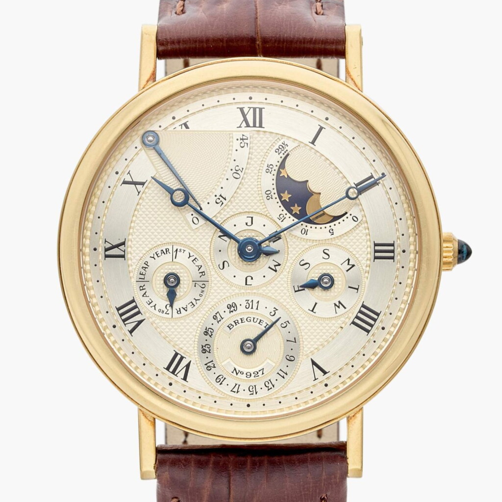 View full screen - View 1 of Lot 362. Reference 3310 Classique | A yellow gold automatic perpetual calendar wristwatch with moon phases, power reserve and leap year indication, Circa 1990.