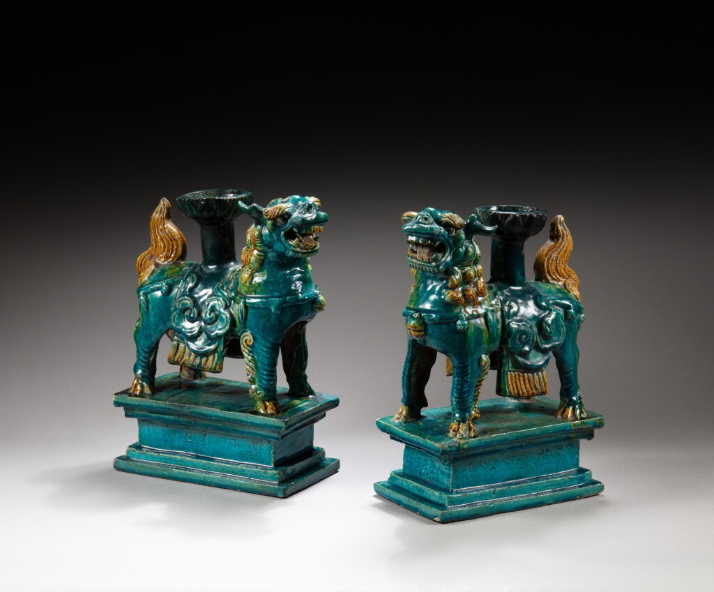 View full screen - View 1 of Lot 24. A pair of turquoise-and-yellow-glazed 'qilin' candlesticks, 17th-18th century | 十七至十八世紀 素三彩麒麟香插一對.