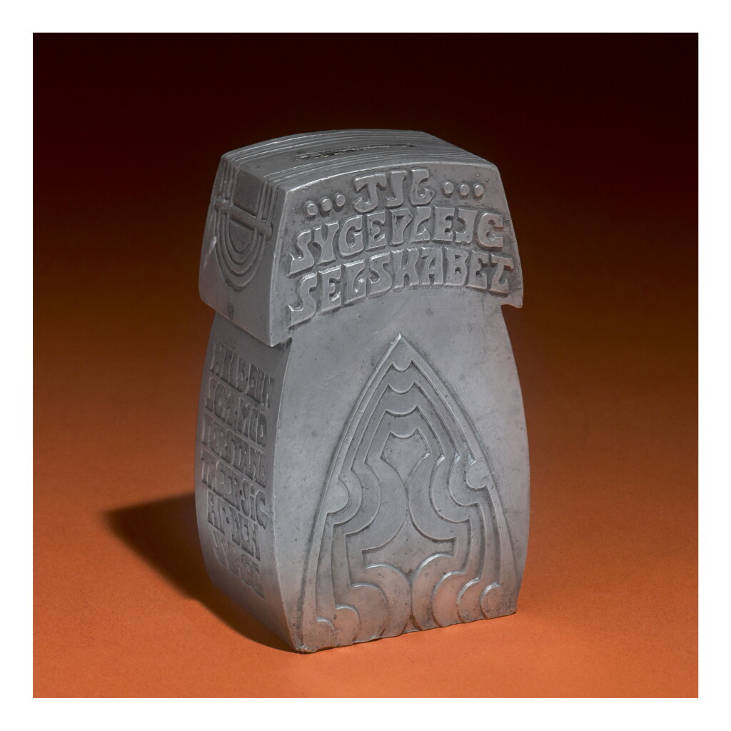 View full screen - View 1 of Lot 67. A DANISH PEWTER CHARITY BOX, DESIGNED BY SIEGFRIED WAGNER AND MADE BY MOGENS BALLIN, 1901.