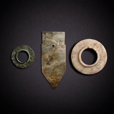 View full screen - View 1 of Lot 7827. Two jade collared discs, huan, and a jade dagger, ge, Shang dynasty | 商 玉有領環兩件及青玉戈一件.