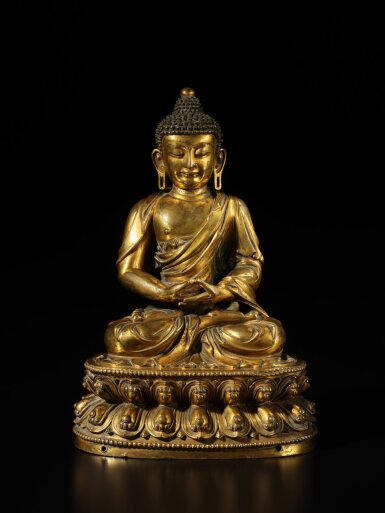 View full screen - View 1 of Lot 105. A gilt-bronze figure of Amitabha Buddha, Ming dynasty, early 15th century.